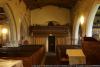 Context image, facing the west wall of the nave, on which the WW1 tablet and Roll of Honour, and the WW2 tablet are visible