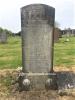 Tall stone family gravestone