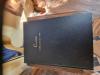 A leather bound Book of Remembrance, commemorating the men of the parish who fell in WW1.