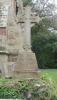 Cross on tapering plinth