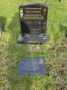 Horizontal stone in front of family gravestone