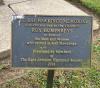 Plaque erected in front of memorial