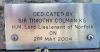 Small metal plaque with dedication date