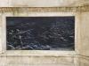 Bronze plaque depicting battle
