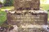 Inlaid lettering on base of memorial