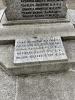 Series of inscribed tablets around a square plinth