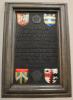 Framed plaque with names in relief