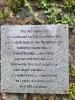 Wall mounted stone tablet with rededication details