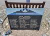Granite block with gold inscription