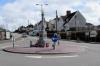Stone pillar in centre of mini roundabout