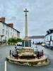 Cross on stepped base with railing surround