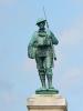 Statue of soldier with rifle on shoulder