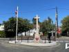 Stone cross in centre of road