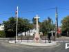 Stone cross in centre of road