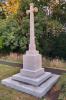 Stone cross with inscribed plinth
