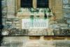 Tablet set into church wall