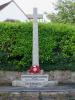 Rough hewn cross on stepped base
