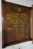 Wooden board with incised names in gold