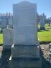 Granite gravestone with "DOUGLAS" along the base