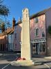 Stone pillar with inscription remembering dead of both world wars
