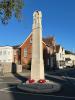 Stone pillar with cross at top