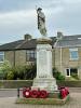 Statue of soldier standing with rifle at the ready