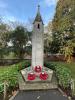 Memorial with wreaths.