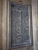 Rectangular stone tablet with incised names. 2 of 2.