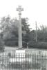 Stone cross on a four tier rectangular base