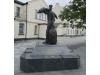 Bronze statue with inscription below