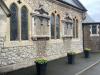 Chapel wall with tablets.
