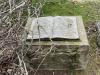 Granite gravestone shaped like an open book