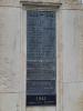 Rectangular metal tablets inscribed with names