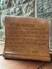 Ceramic scroll with inscription situated on window ledge