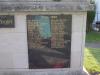 Rectangular black granite plaque inscribed in gold lettering
