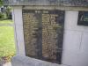 Rectangular black granite plaque inscribed with gold lettering