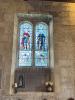 WW1 memorial stained glass window and stone tablet in St Andrews Church Sevenhampton