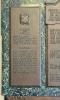 Dedicatory grouping of metal plaques