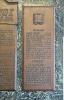 Dedicatory grouping of metal plaques