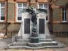 Memorial's front face in September 2011, with the figure of Victory in foreground, and bronze WW1 and WW2 plaques attached to the wall. (The plaques were stolen a few weeks later).