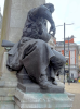 Figure seated