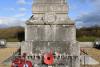 names on war memorial stone pillar