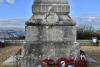 names on war memorial stone pillar