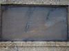 List of names incised on stone plaque.