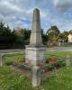 Obelisk on rectangular base with railing surround