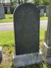 Gravestone with a fully rounded top