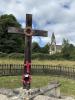 Woodchester Wayside Cross WW1 memorial left hand fence with plaque and silent soldier