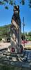 Sculpture of First World War soldier on side of memorial.