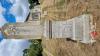 Grey Cornish Granite column on block and two-stepped base.
