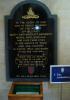 Memorial tablet mounted on a board